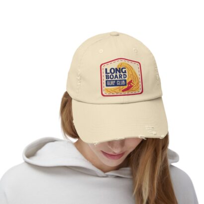 Lady wearing a face cap with a design imprinted on the front